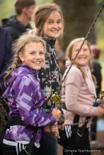 smiling girls fishing