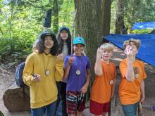 smiling group of kids at camp