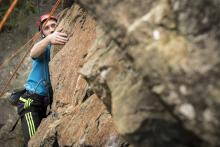 man rock climbing