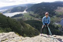 woman rock climbing