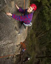 woman rock climbing