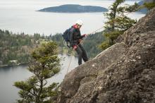 woman rock climbing