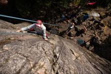 people rock climbing